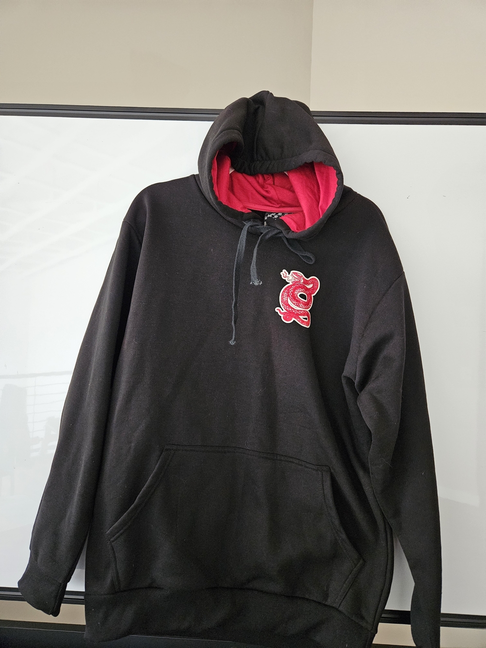 rebels Black Hoodie with Red Lining and Red Chest Patch